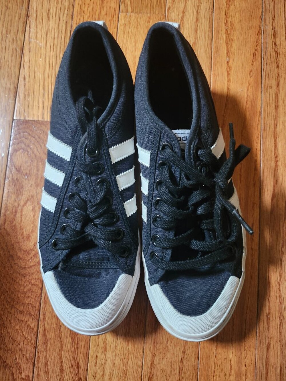 Adidas Originals Nizza platform trainers in black/white